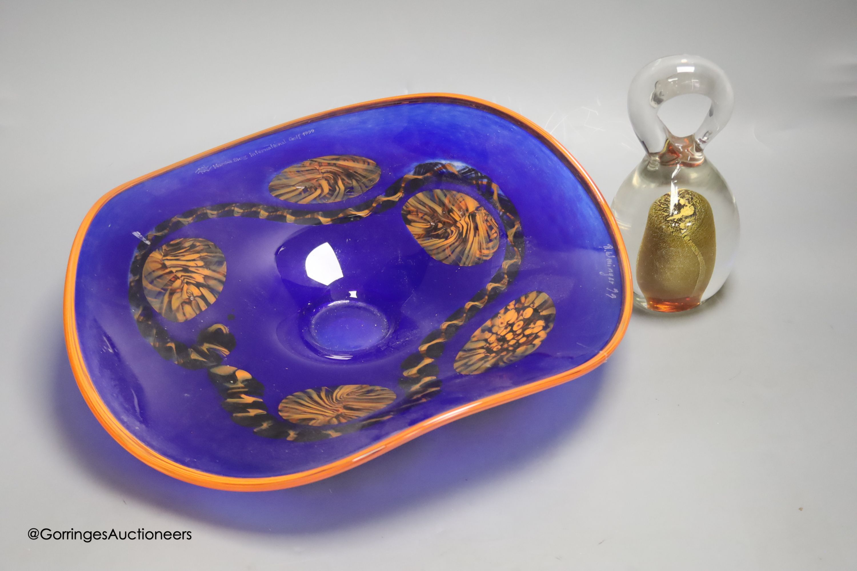 A signed Art glass dish, diameter 38cm, and a Medina glass dump paperweight